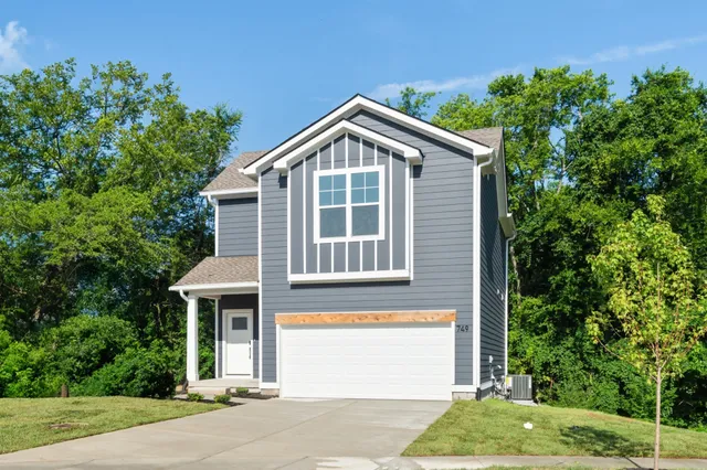 an aerial view of a house with a garden