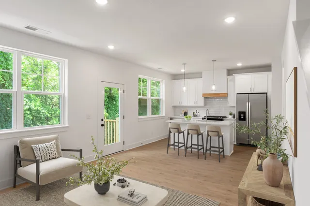 a view of a dining room with furniture window and outside view