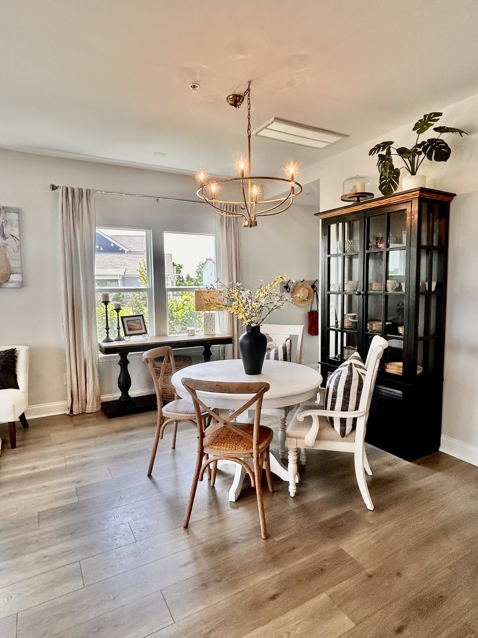 1000 June Wilde Ridge Spring Hill, TN 37174 - Photo 11 of 37 a view of a dining room with furniture window and wooden floor