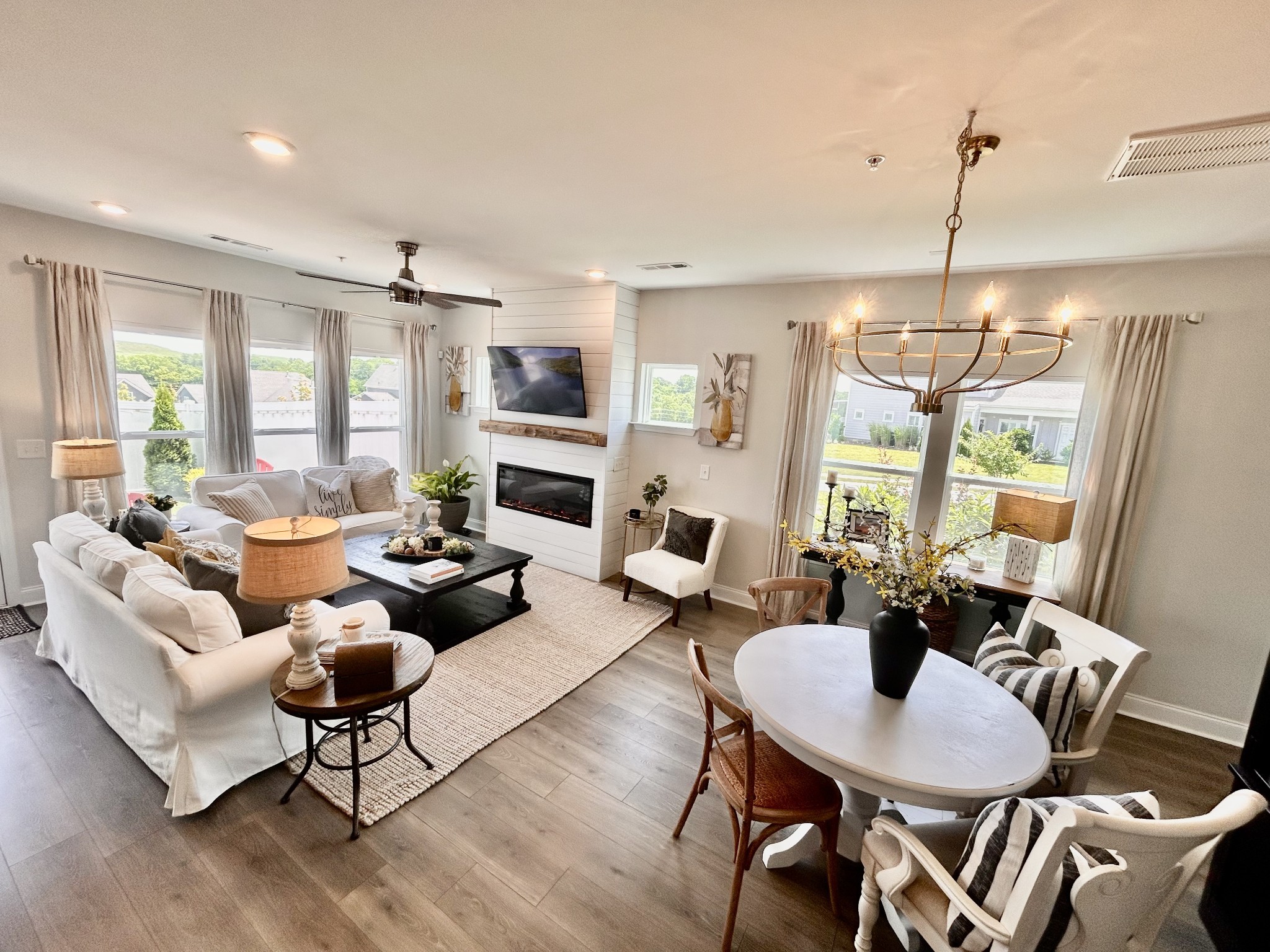 1000 June Wilde Ridge Spring Hill, TN 37174 - Photo 13 of 37 a living room with furniture chandelier and a large window