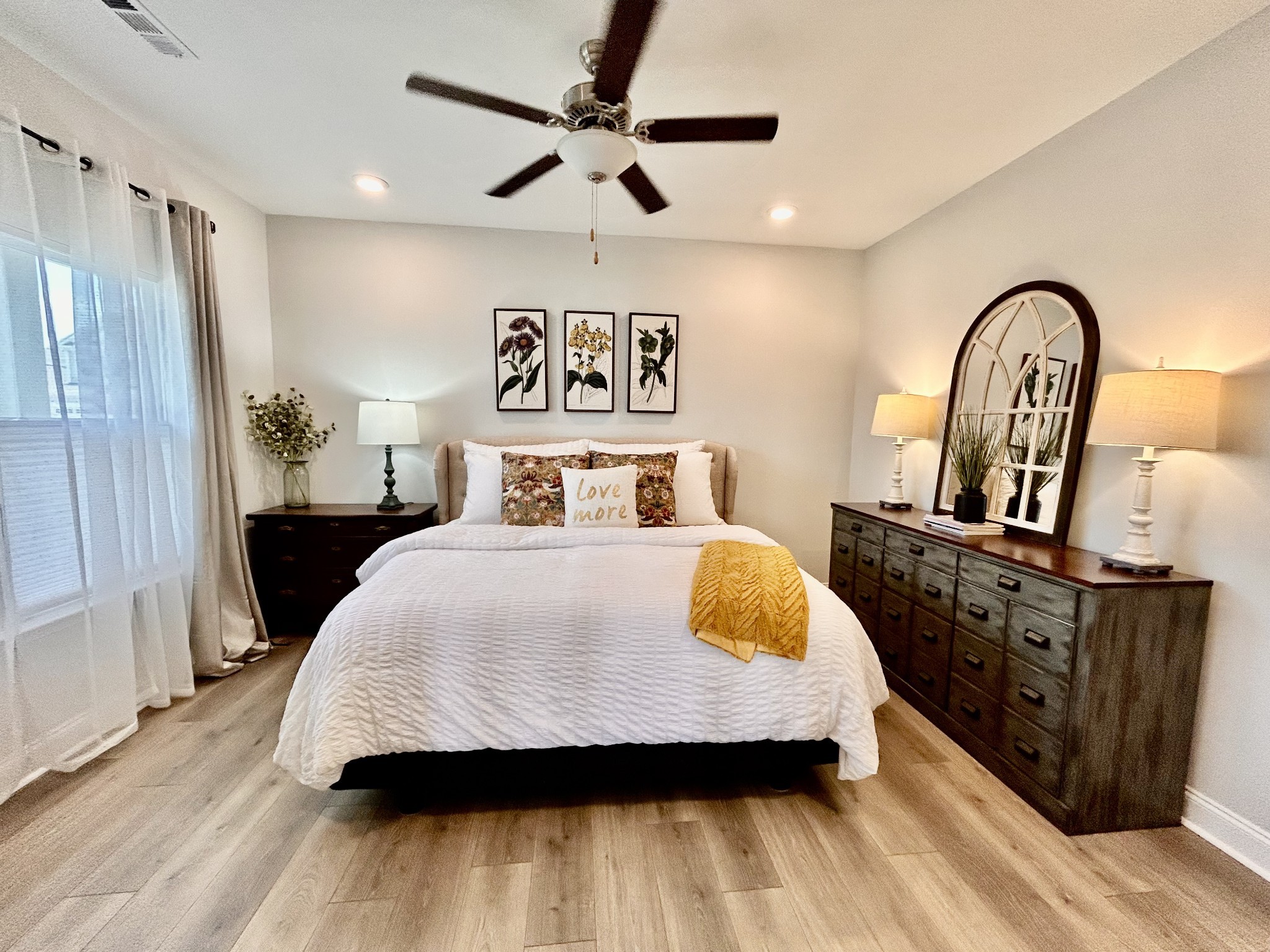 1000 June Wilde Ridge Spring Hill, TN 37174 - Photo 14 of 37 a bedroom with a bed and dresser with wooden floor