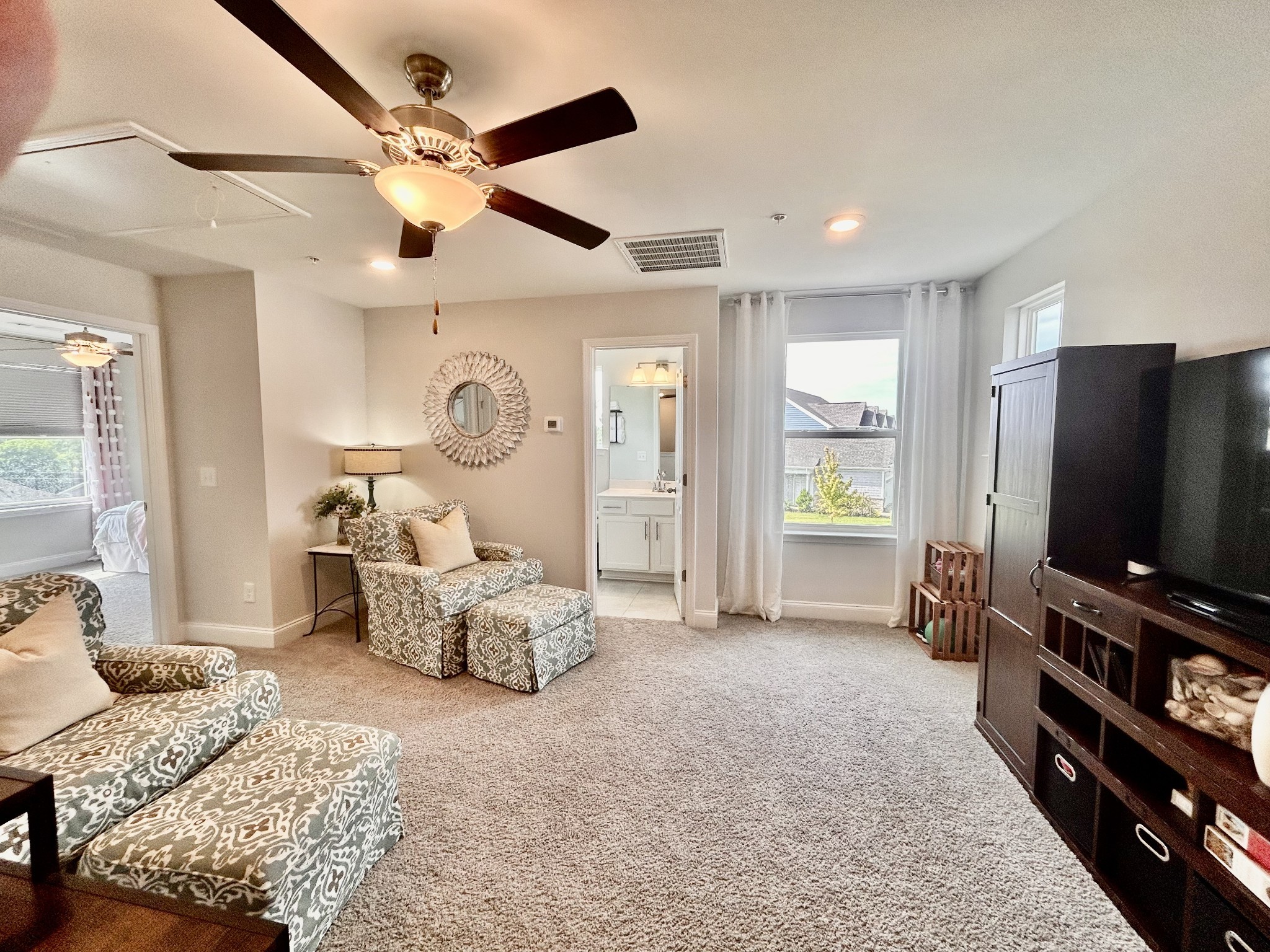 1000 June Wilde Ridge Spring Hill, TN 37174 - Photo 19 of 37 a living room with furniture and a flat screen tv