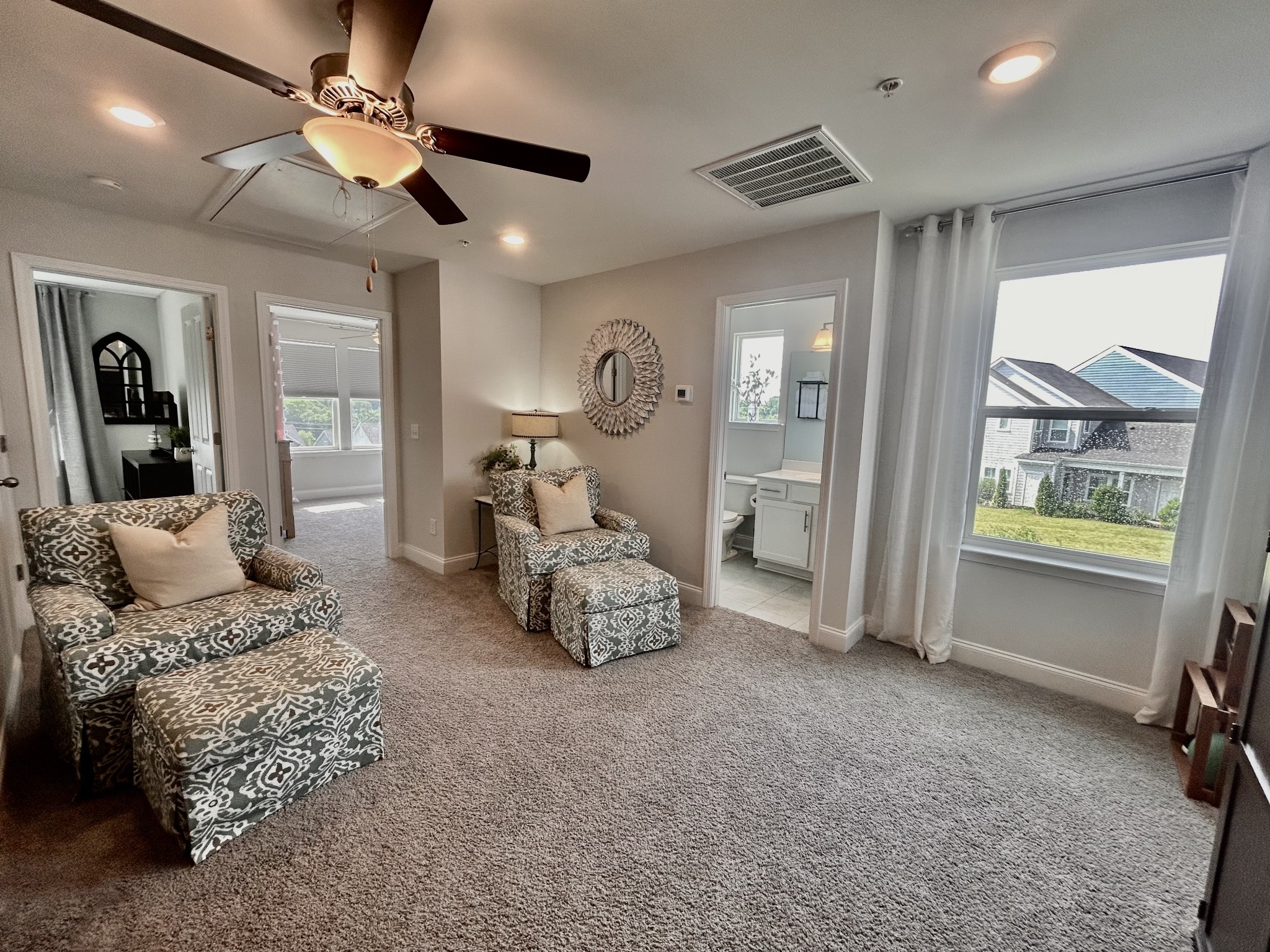 1000 June Wilde Ridge Spring Hill, TN 37174 - Photo 21 of 37 a bedroom with furniture and a large window
