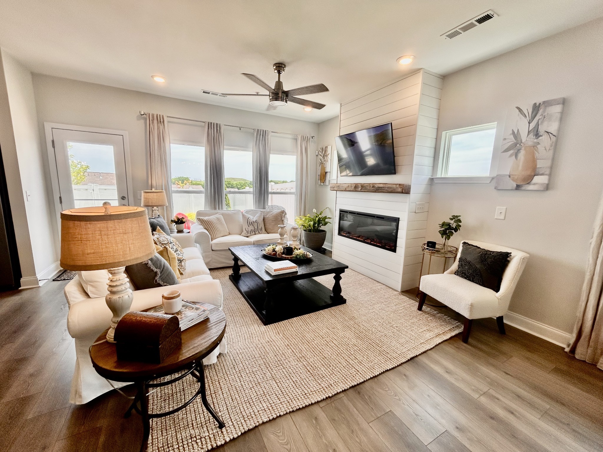 1000 June Wilde Ridge Spring Hill, TN 37174 - Photo 7 of 37 a living room with furniture fireplace and flat screen tv