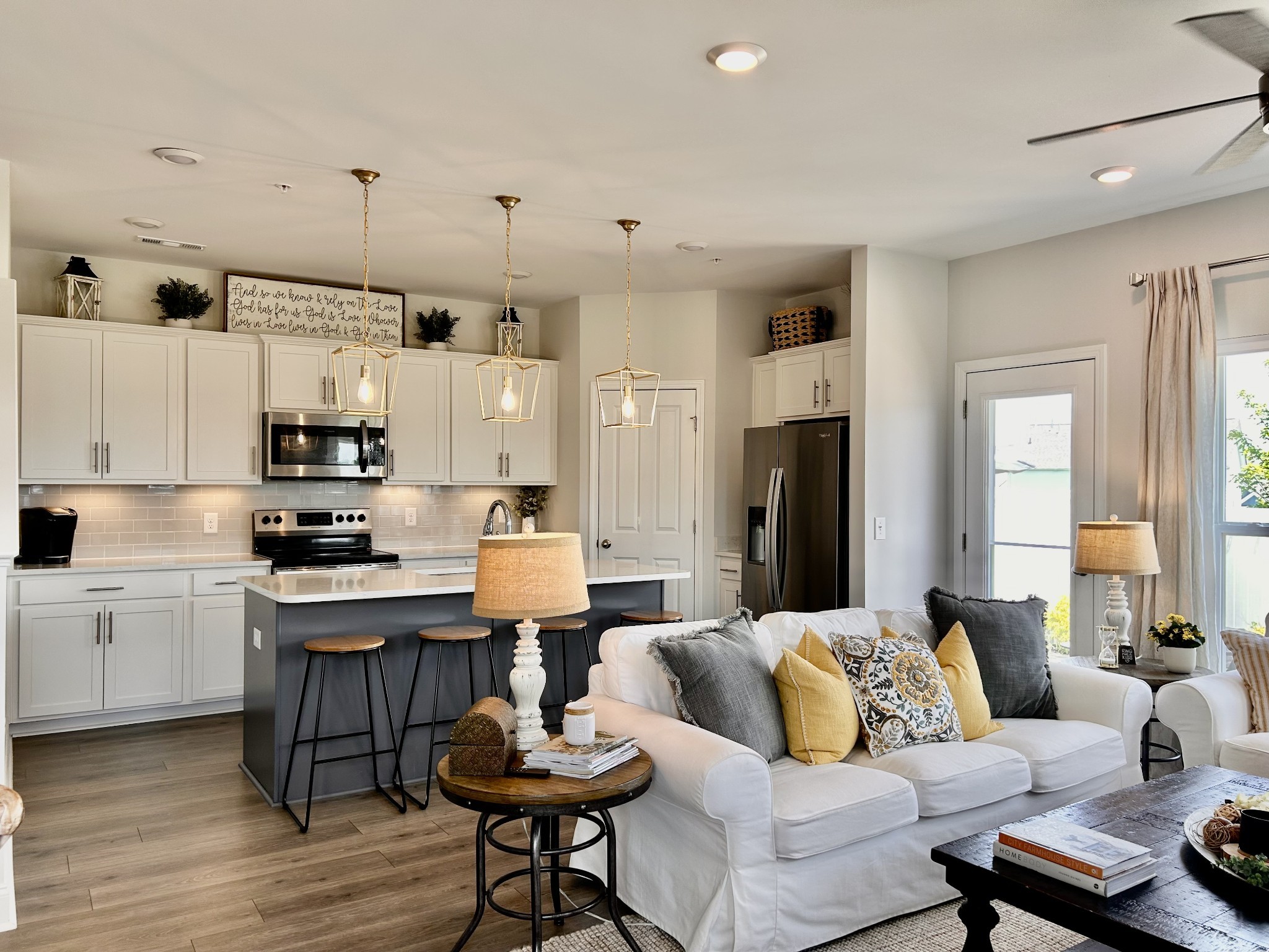 1000 June Wilde Ridge Spring Hill, TN 37174 - Photo 8 of 37 a living room with kitchen furniture and kitchen view
