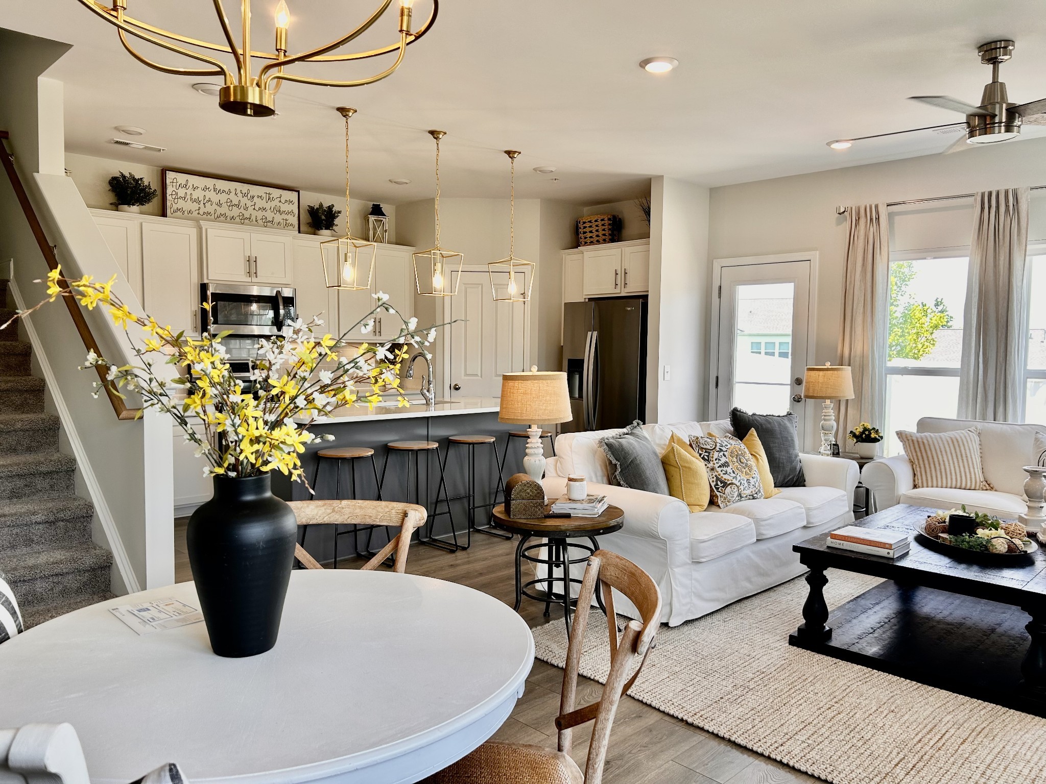 1000 June Wilde Ridge Spring Hill, TN 37174 - Photo 10 of 37 a living room with lots of furniture and a chandelier