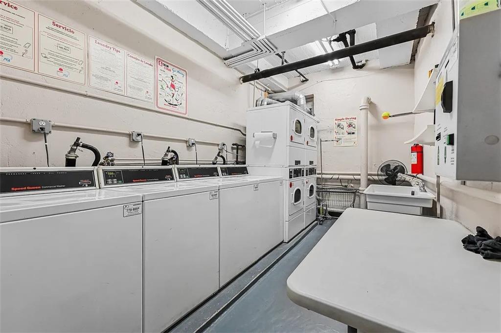 9430 Ridge Boulevard, Unit 6F Brooklyn, NY 11209 - Photo 12 of 15 a kitchen with cabinets a sink and appliances