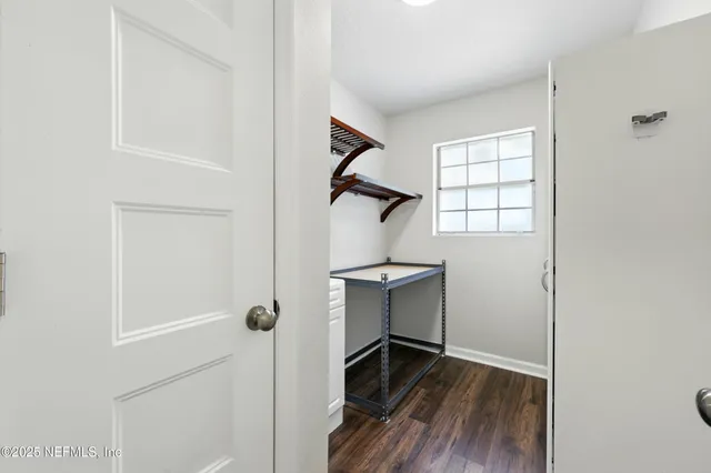 a view of entryway with wooden floor