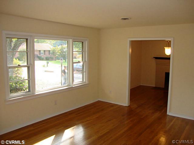 6620 Holborn Road Richmond, VA 23224 - Photo 5 of 20 Living Room - Nice sized living room with Refinish