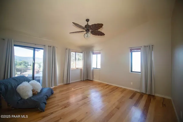 a bed room with a bed and a window