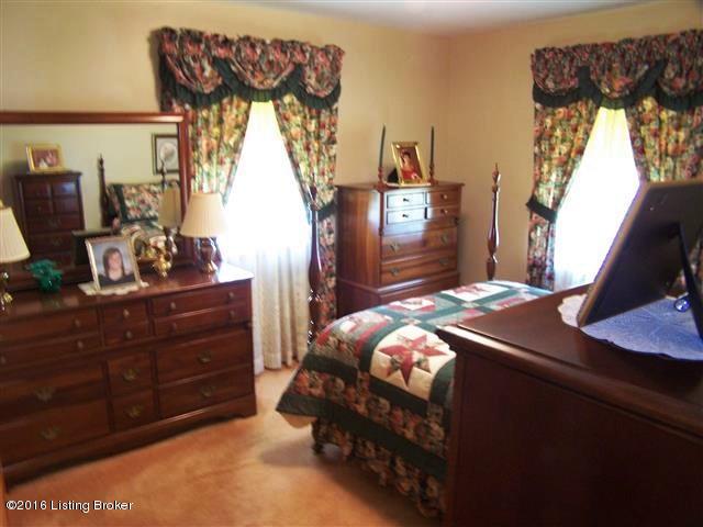 10907 Deering Road Louisville, KY 40272 - Photo 35 of 38 Bedroom #2 for this home with double door closet, overhead lighting, carpeting with hardwood underneath and access to the Full Bath.