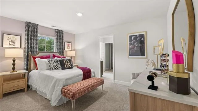 a bedroom with a bed wooden floor and window