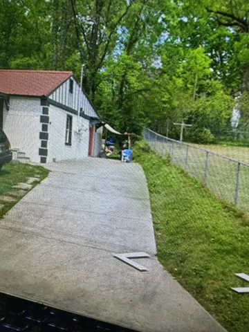 a house view with a garden space