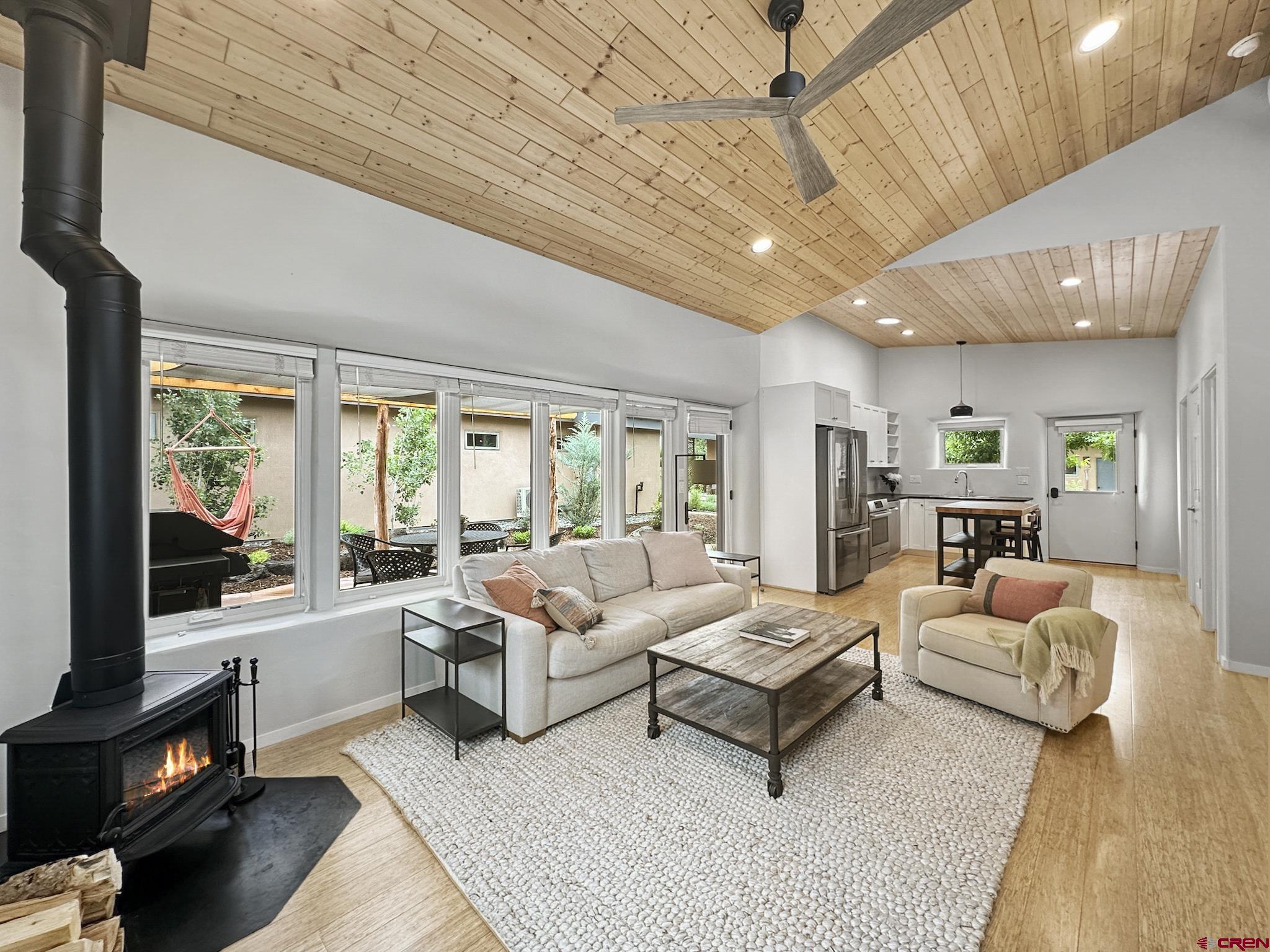 1200 3rd Street, Unit 6 Paonia, CO 81428 - Photo 11 of 34 a living room with furniture and a flat screen tv