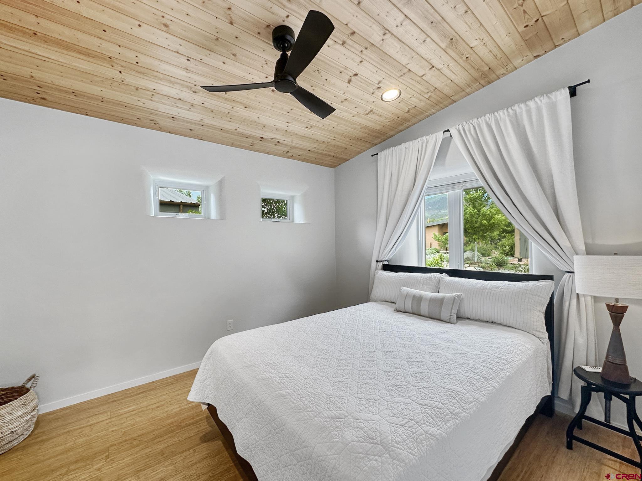 1200 3rd Street, Unit 6 Paonia, CO 81428 - Photo 15 of 34 a bedroom with a bed and a window