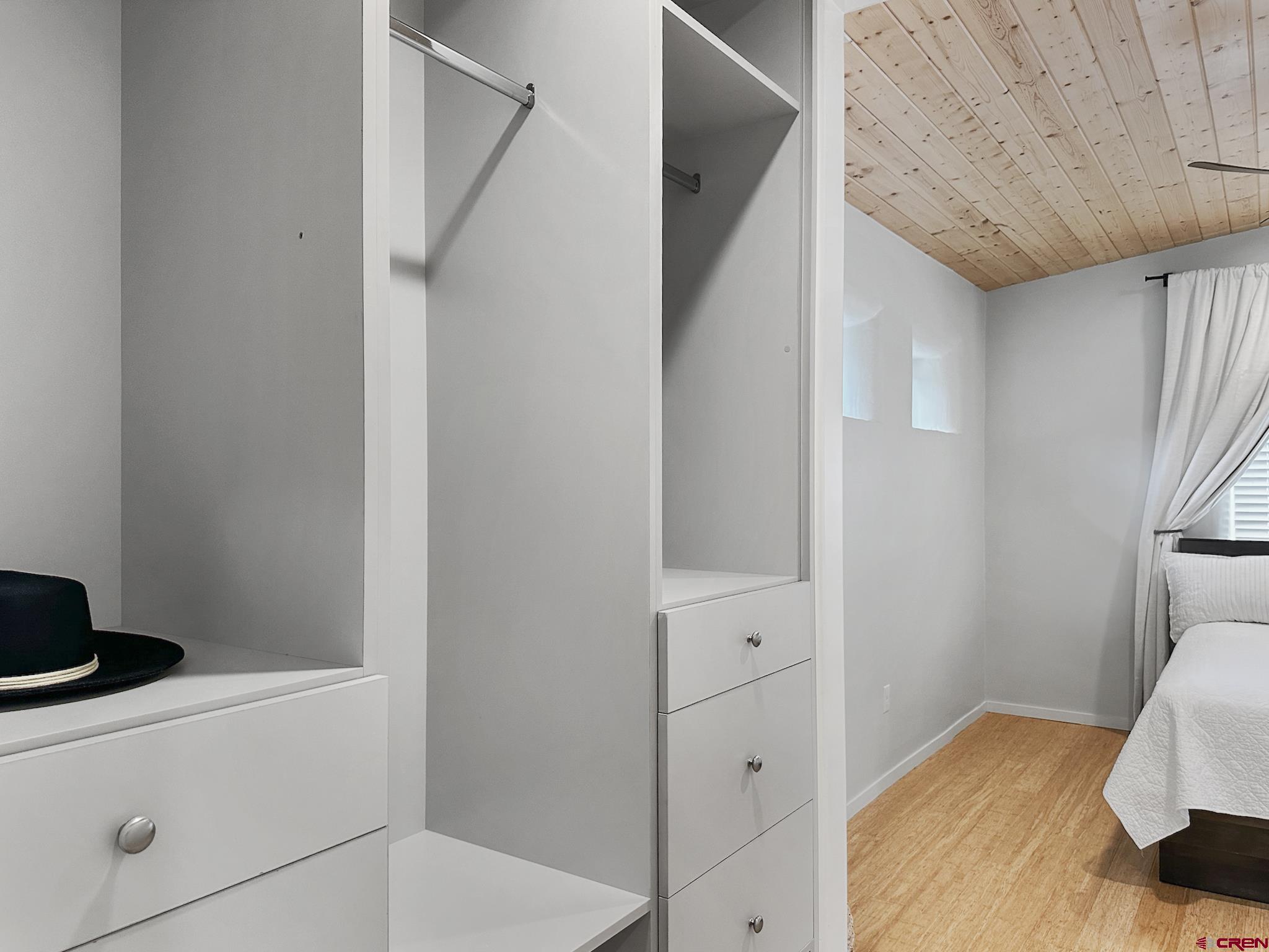 1200 3rd Street, Unit 6 Paonia, CO 81428 - Photo 19 of 34 a bedroom with a bed and a cabinets