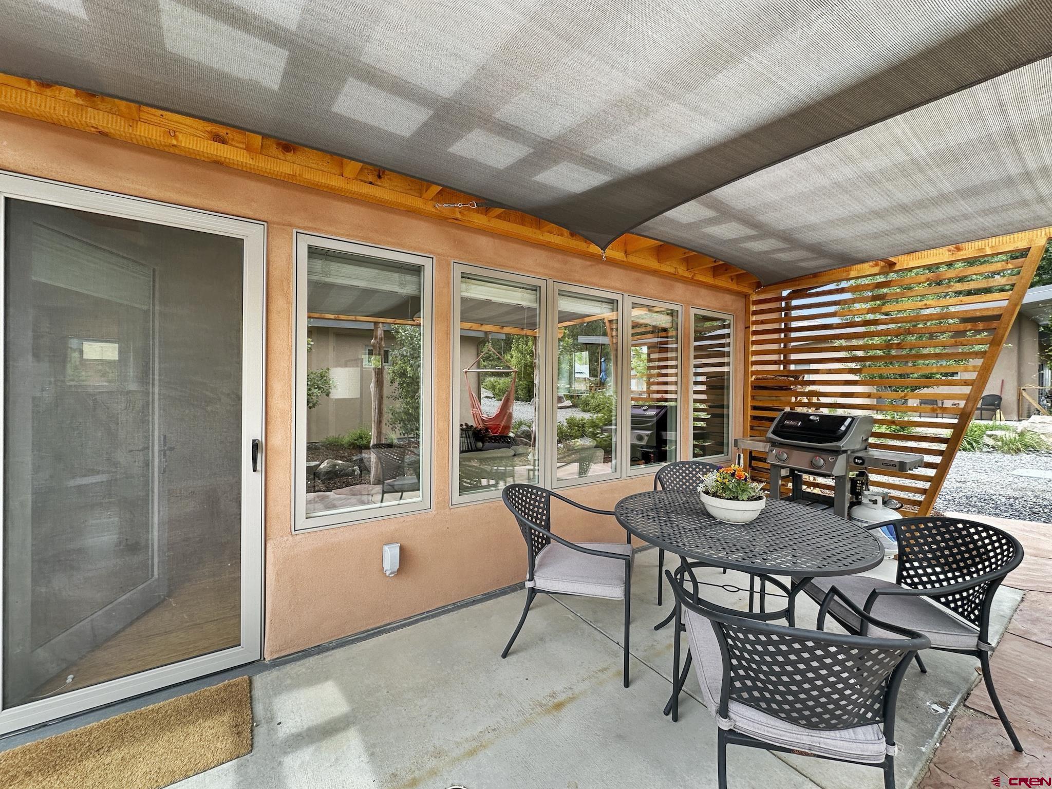 1200 3rd Street, Unit 6 Paonia, CO 81428 - Photo 26 of 34 a dining room with furniture and front door
