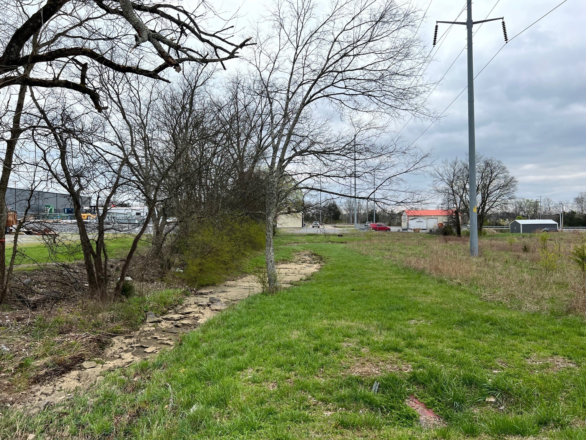 0 Garrett Road Shelbyville, TN 37160 - Photo 2 of 6 a backyard of a house with lots of green space