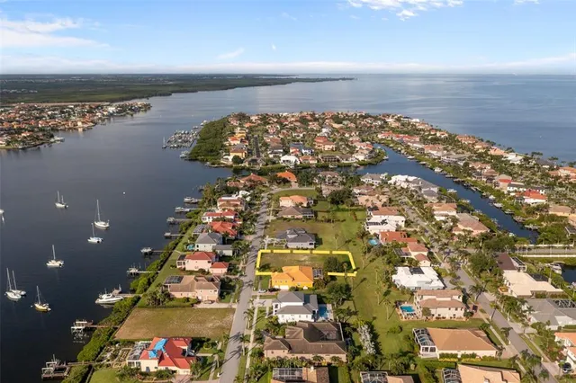 an aerial view of beach and city