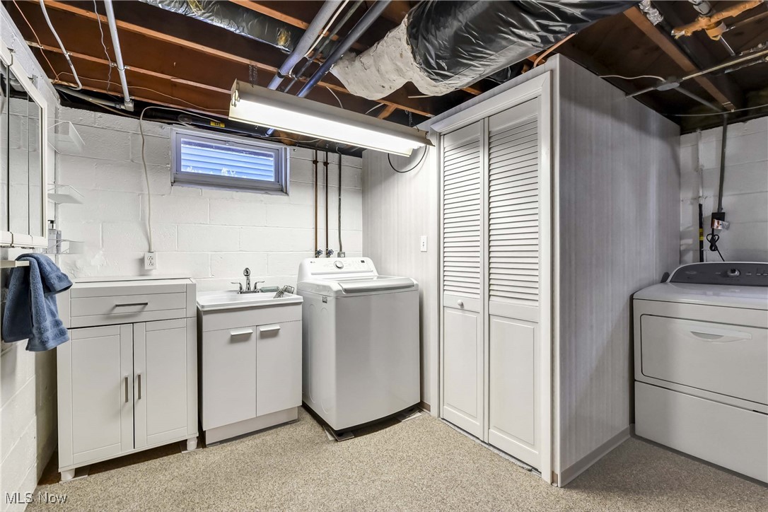 17239 Fowles Road Cleveland, OH 44130 - Photo 29 of 43 Washroom featuring washing machine and dryer and sink
