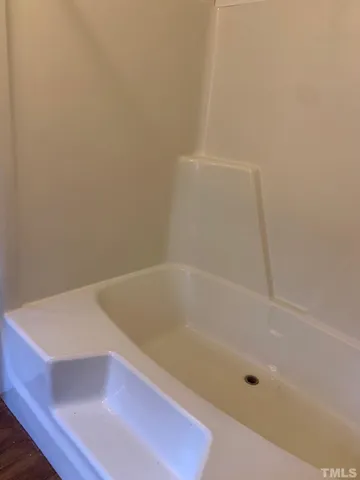 a bathroom with a tub