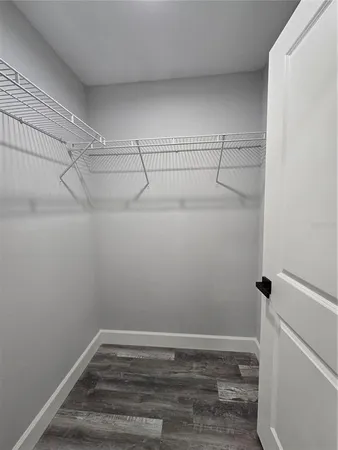 a view of a room with racks on the wall