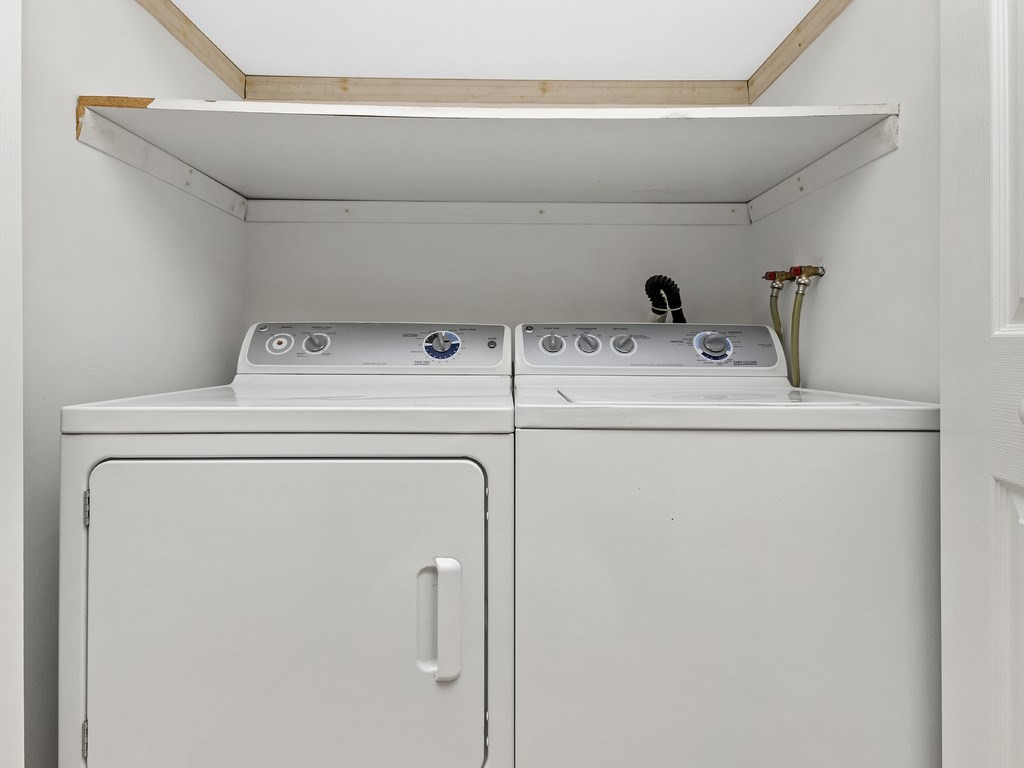 25 Marion Street, Unit PH3 Brookline, MA 02446 - Photo 14 of 22 a utility room with dryer and washer
