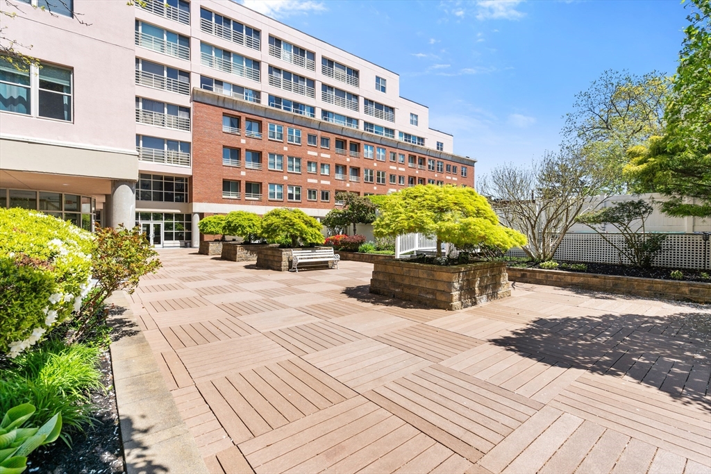 25 Marion Street, Unit PH3 Brookline, MA 02446 - Photo 20 of 22 a building view with a outdoor space