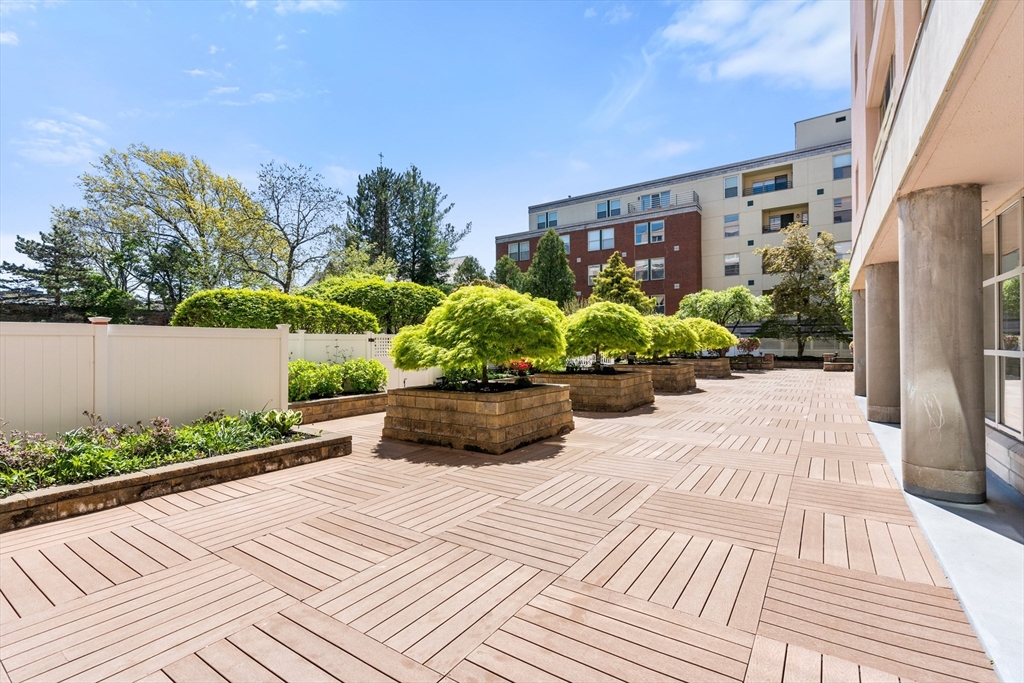 25 Marion Street, Unit PH3 Brookline, MA 02446 - Photo 21 of 22 a view of a balcony with furniture
