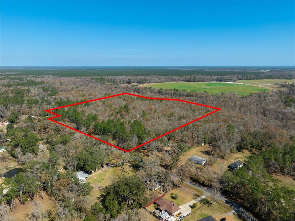 Fouracre Circle Callahan, FL 32011 - Photo 2 of 31 an aerial view of a tennis court