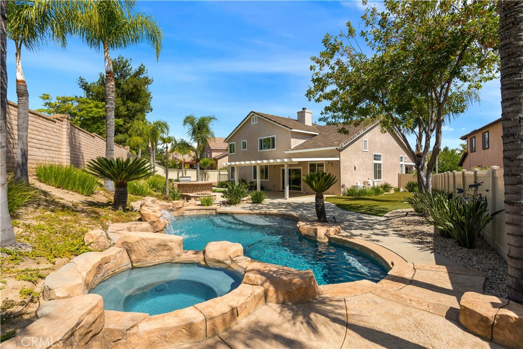 33351 Nicholas Common Temecula, CA 92592 - Photo 2 of 42 a view of a house with swimming pool and sitting area