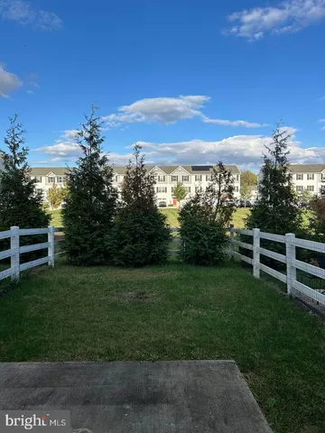 a view of a yard with an outdoor space