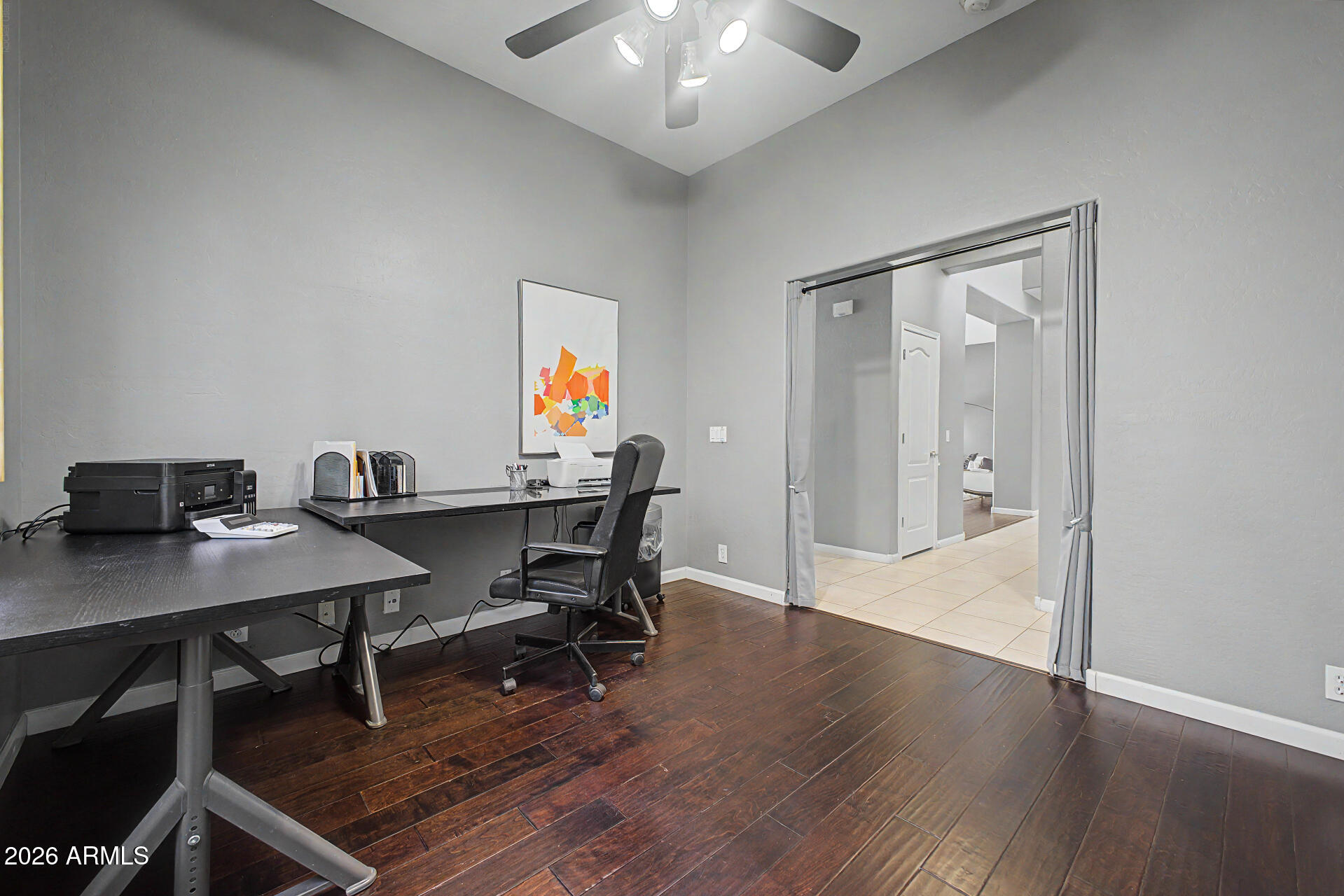 1632 West Frye Road Phoenix, AZ 85045 - Photo 17 of 37 a workspace with furniture and wooden floor