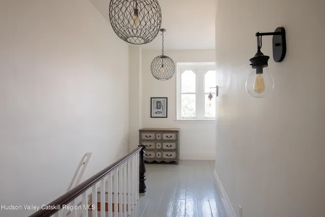 a view of entryway with stairs