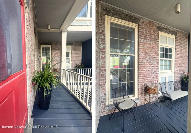 a view of a porch with wooden floor and floor to ceiling window