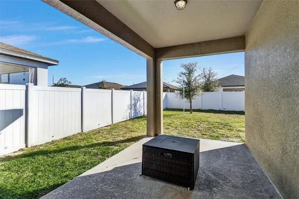 a house view with a backyard space