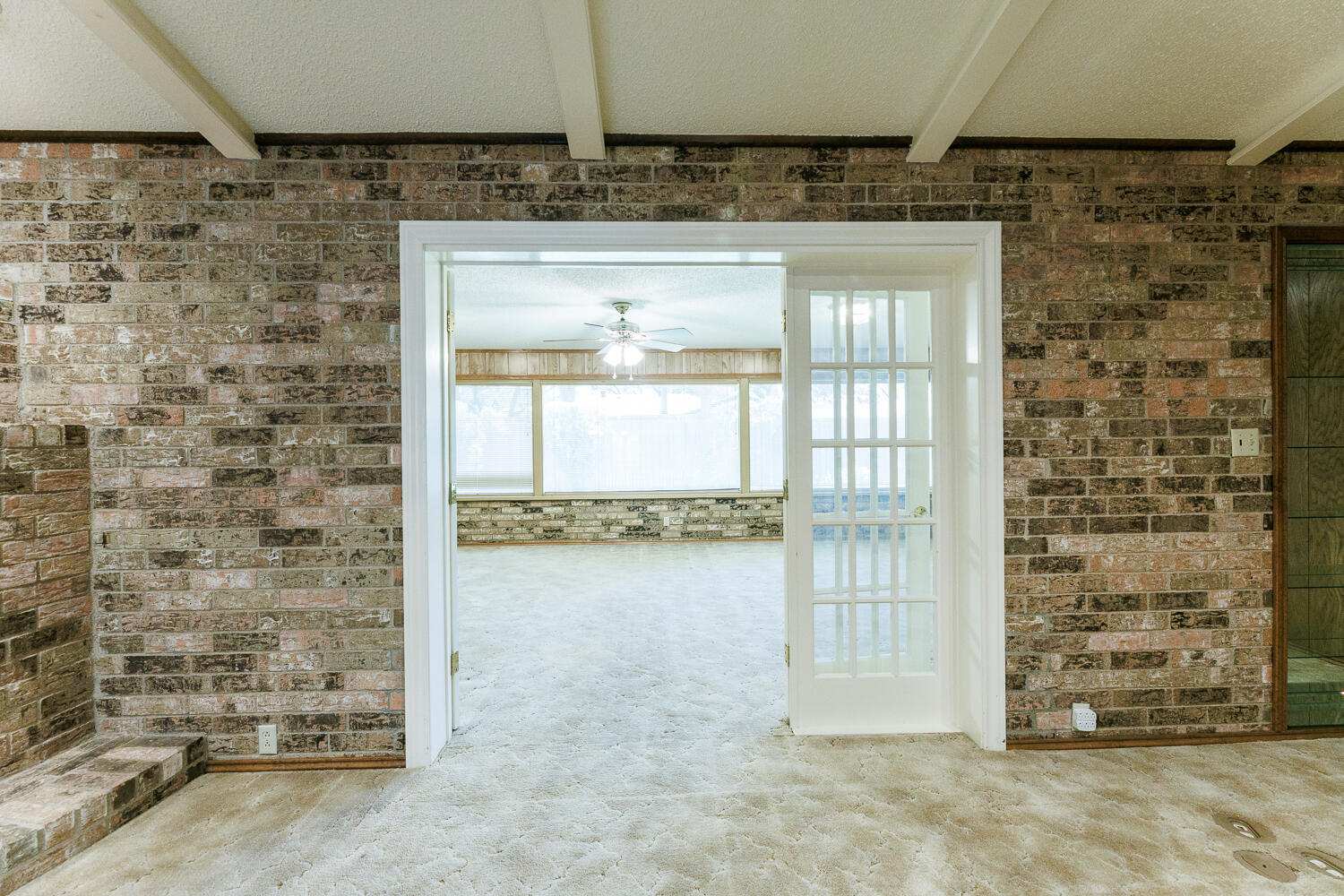 4419 79th Street Lubbock, TX 79424 - Photo 19 of 47 Living Room Opens to Sunroom