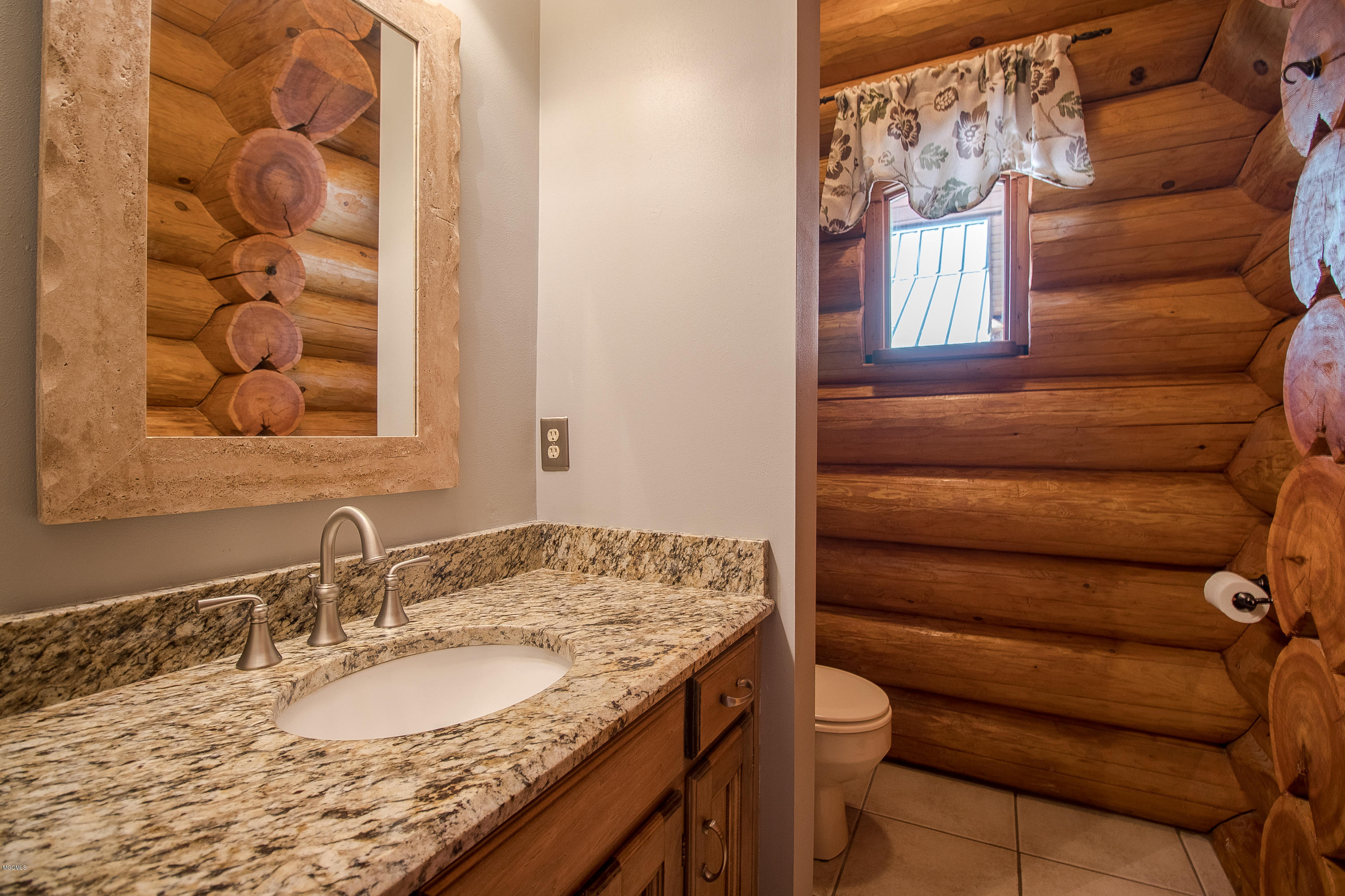 7190 Paradise Road Kiln, MS 39556 - Photo 36 of 67 7190 Paradise Half Bathroom