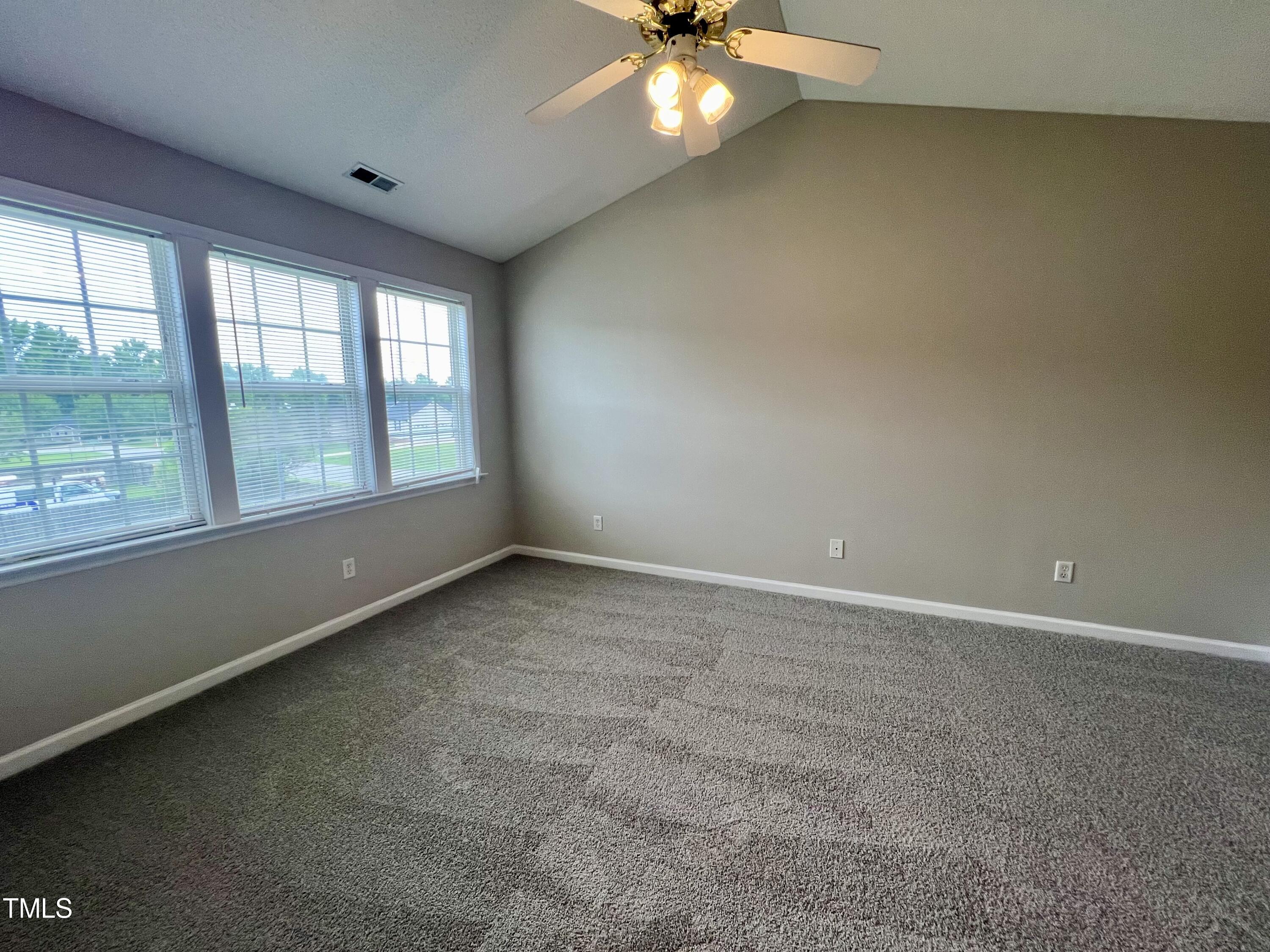 1312 Harvey Johnson Road Raleigh, NC 27603 - Photo 23 of 29 an empty room with a window