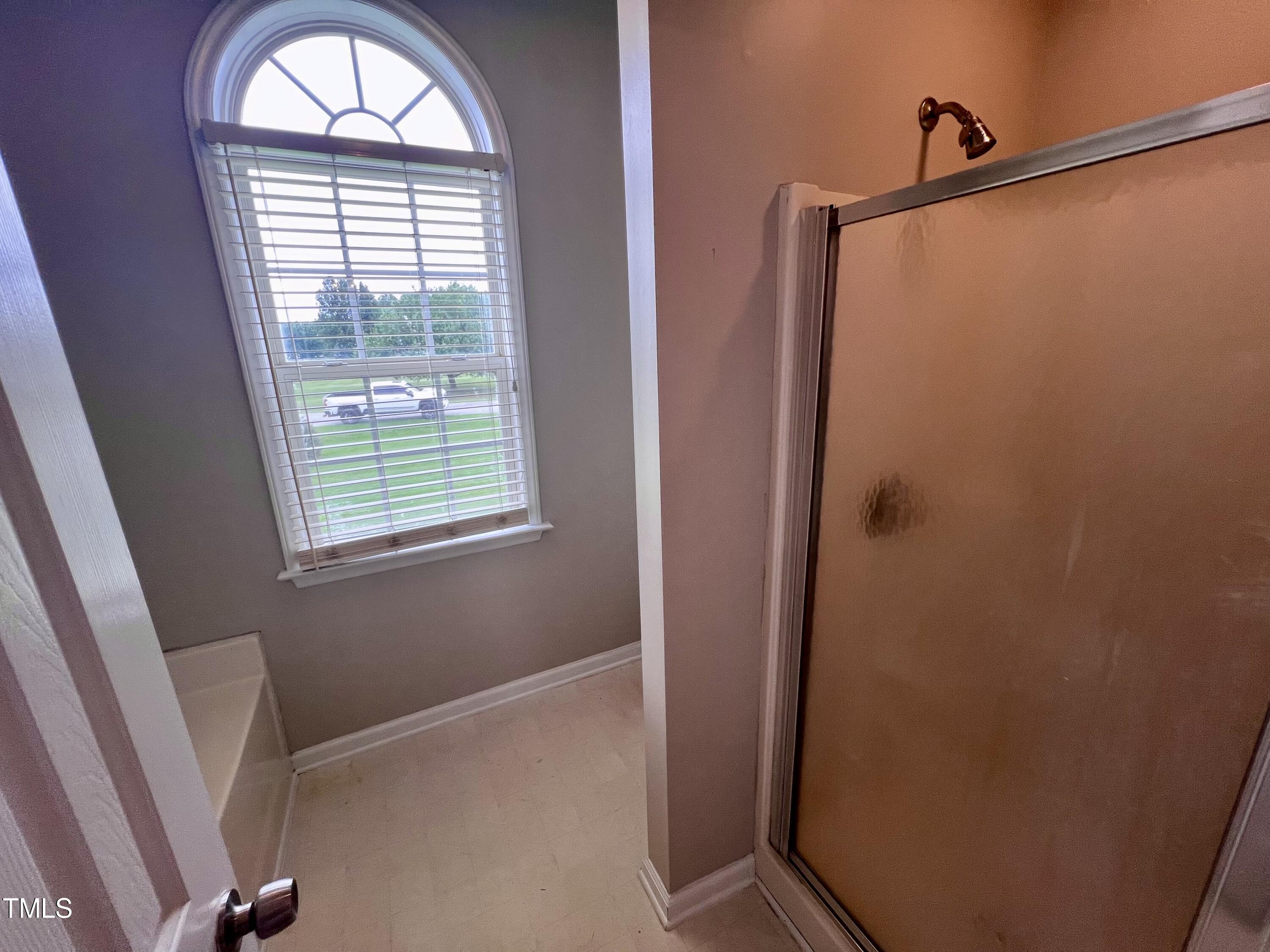 1312 Harvey Johnson Road Raleigh, NC 27603 - Photo 26 of 29 a view of entryway with wooden floor and window