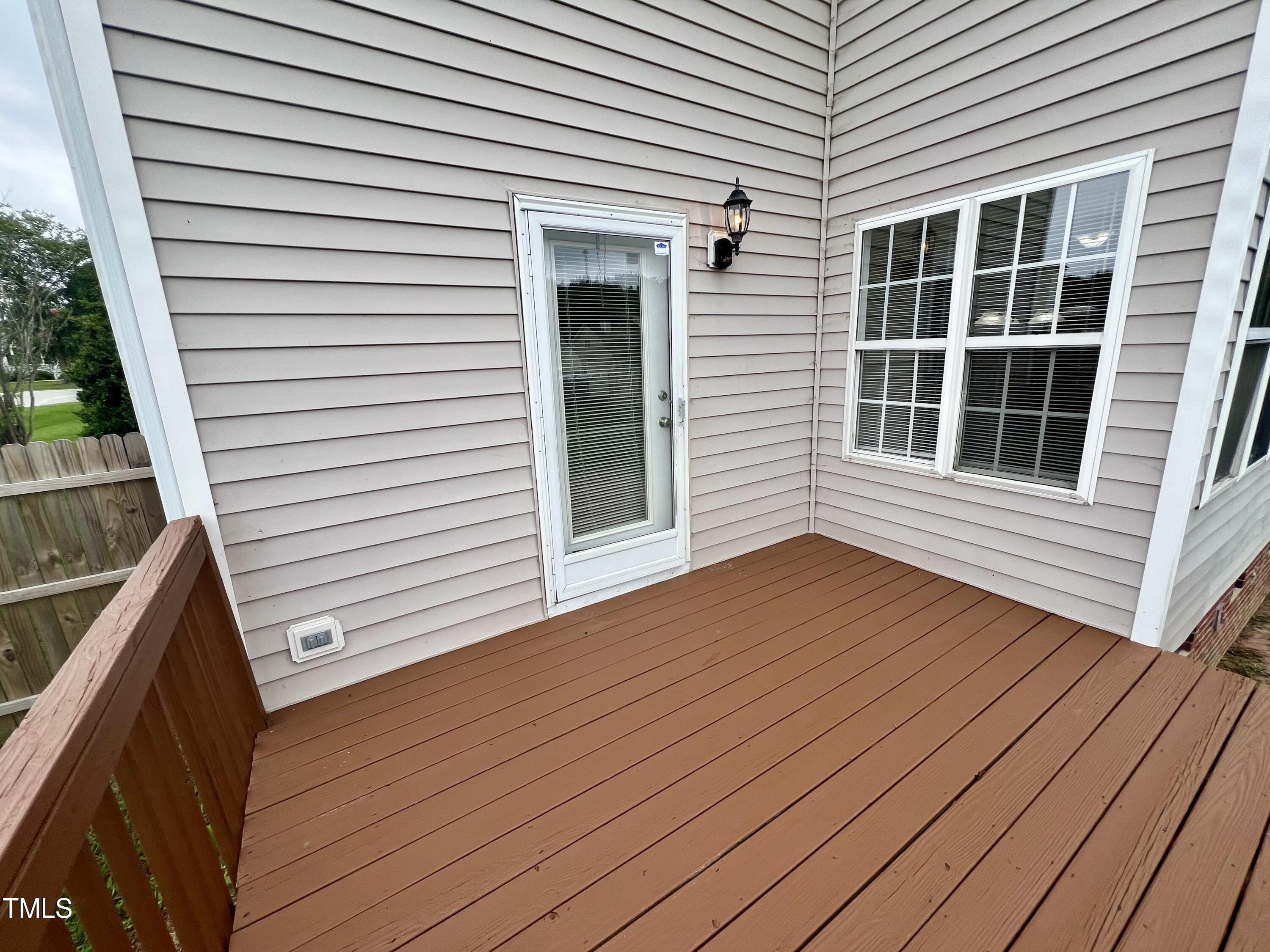 1312 Harvey Johnson Road Raleigh, NC 27603 - Photo 27 of 29 a view of outdoor space and deck with wooden floor