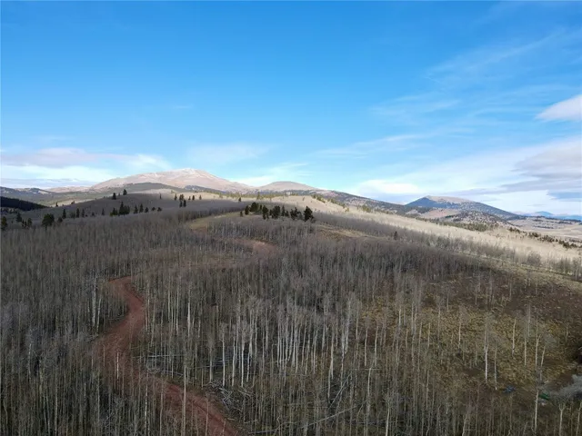 a view of a lake with mountains in the background