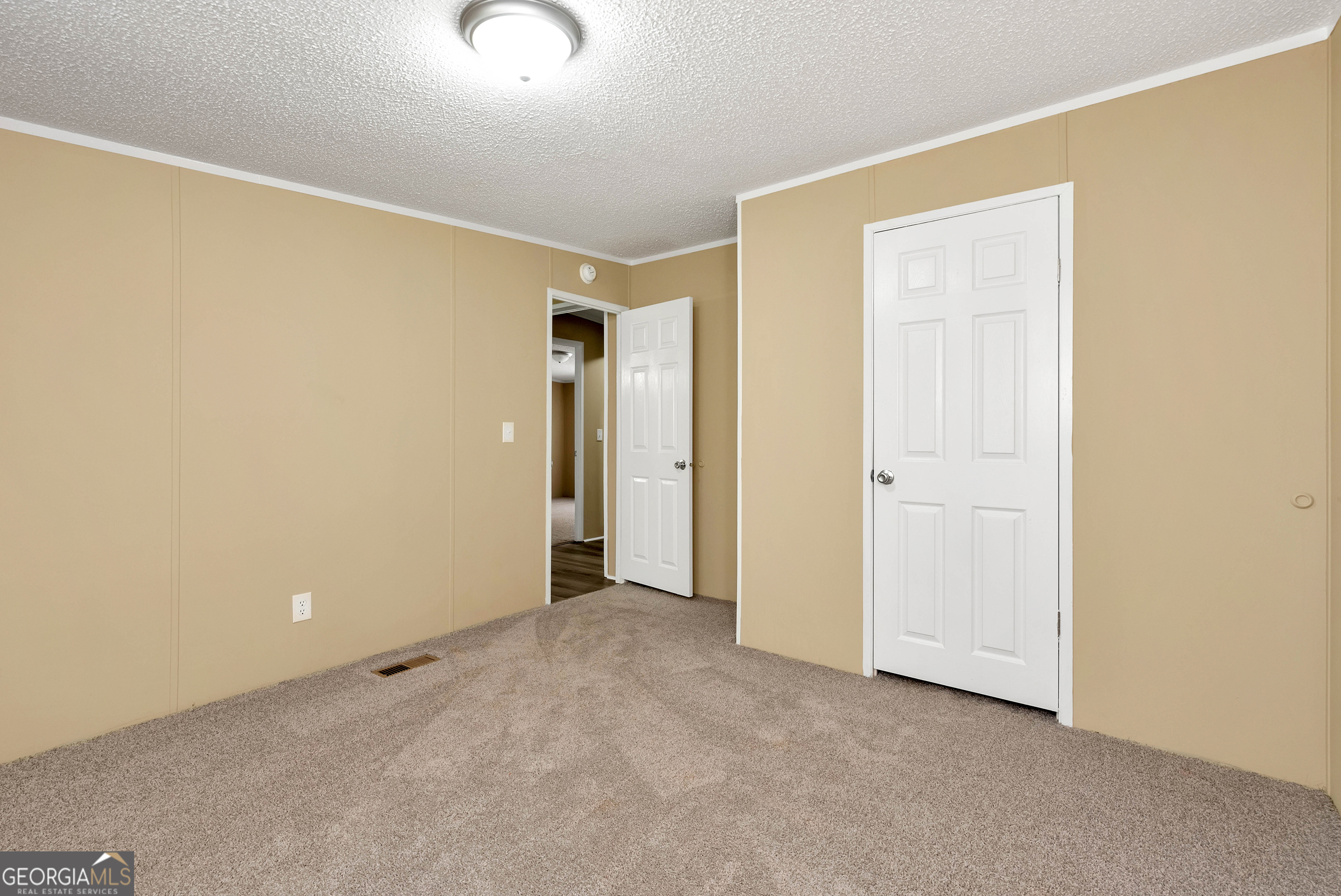 255 Double Branch Road Danielsville, GA 30633 - Photo 17 of 46 a view of an empty room