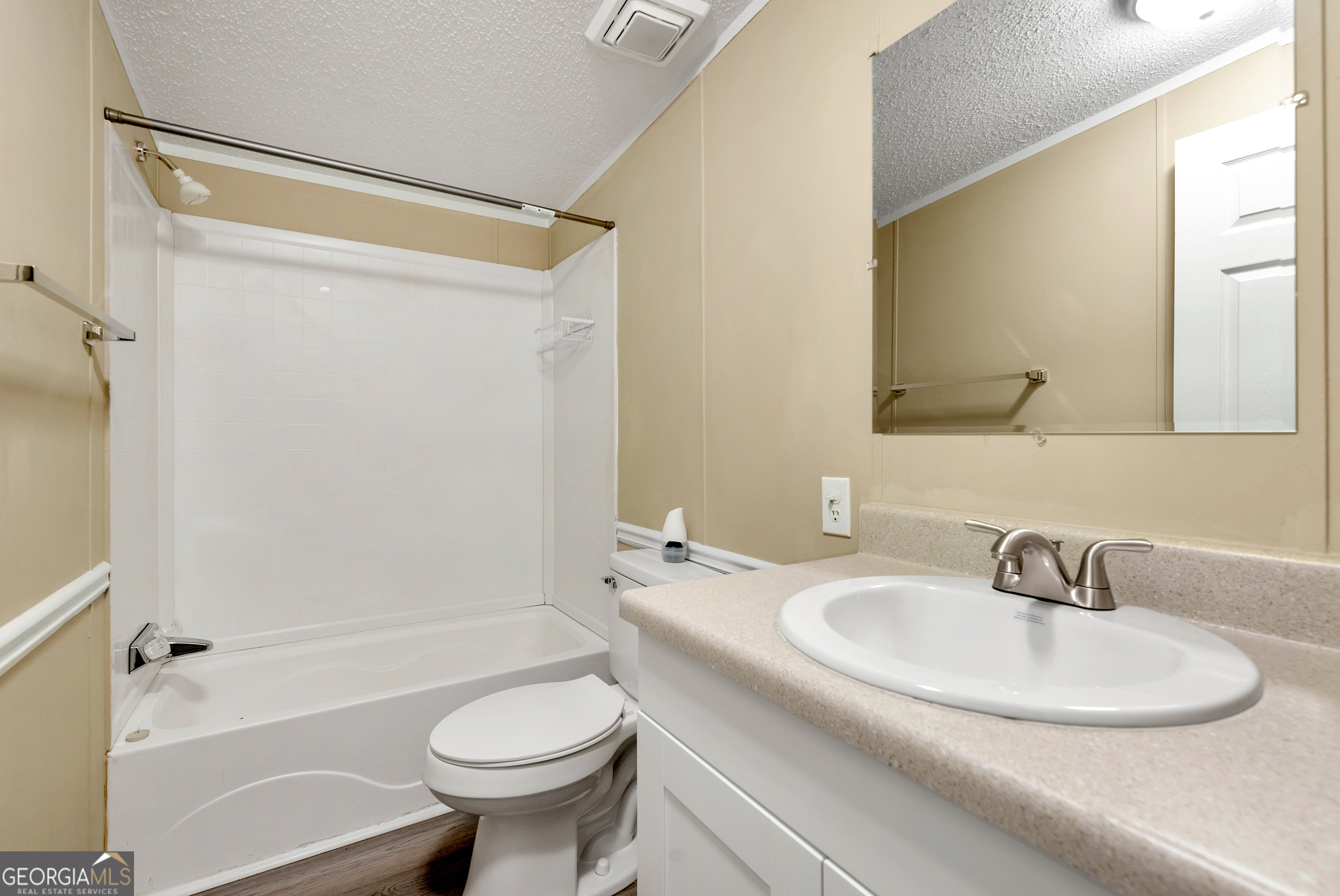 255 Double Branch Road Danielsville, GA 30633 - Photo 21 of 46 a bathroom with a sink toilet and shower