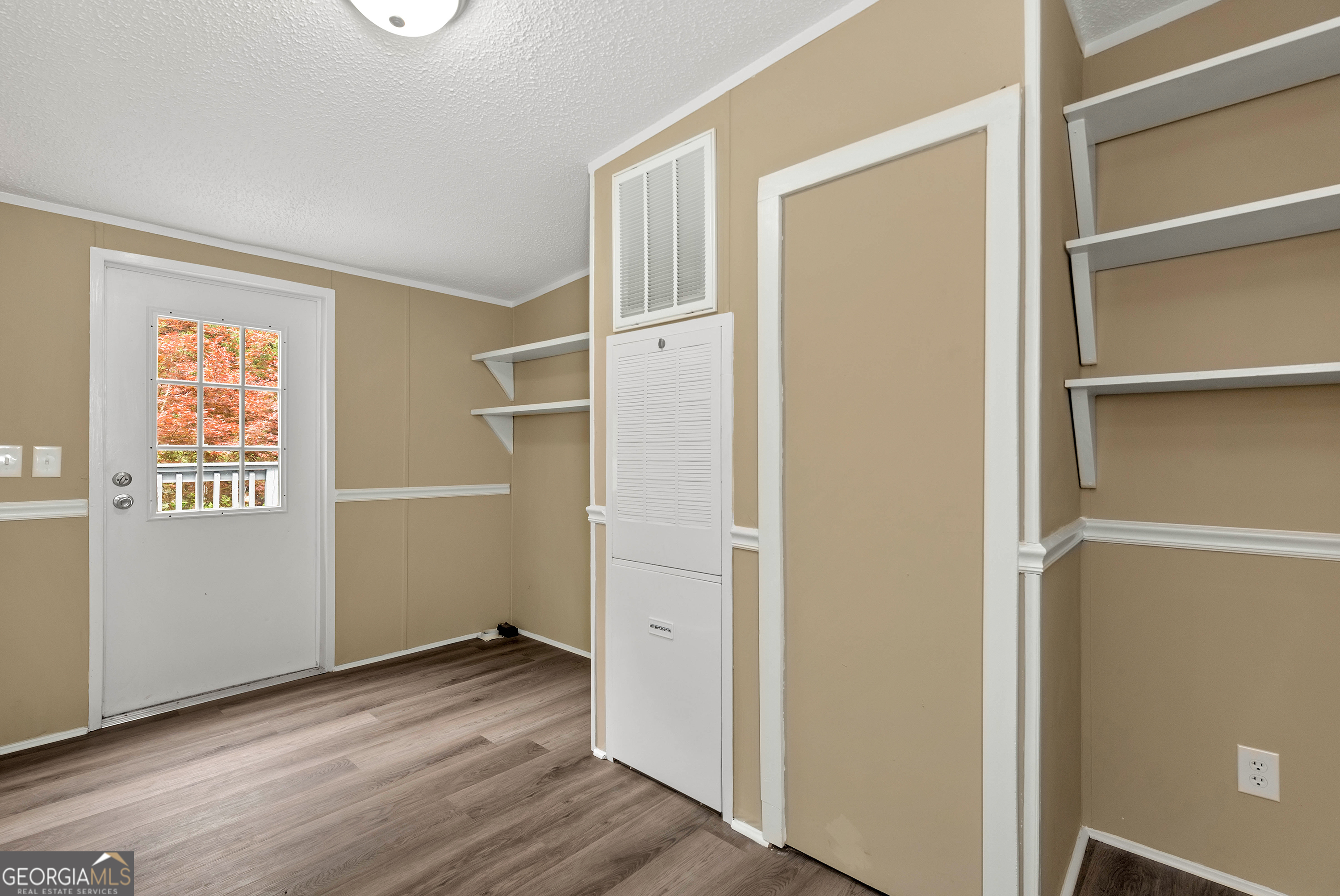 255 Double Branch Road Danielsville, GA 30633 - Photo 23 of 46 a view of empty room with wooden floor