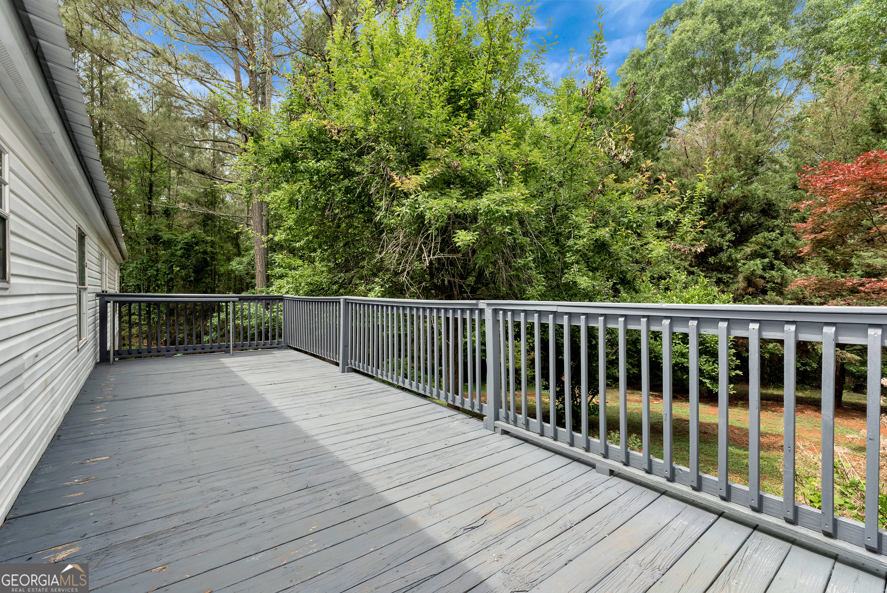 255 Double Branch Road Danielsville, GA 30633 - Photo 41 of 46 a view of balcony with wooden floor and fence