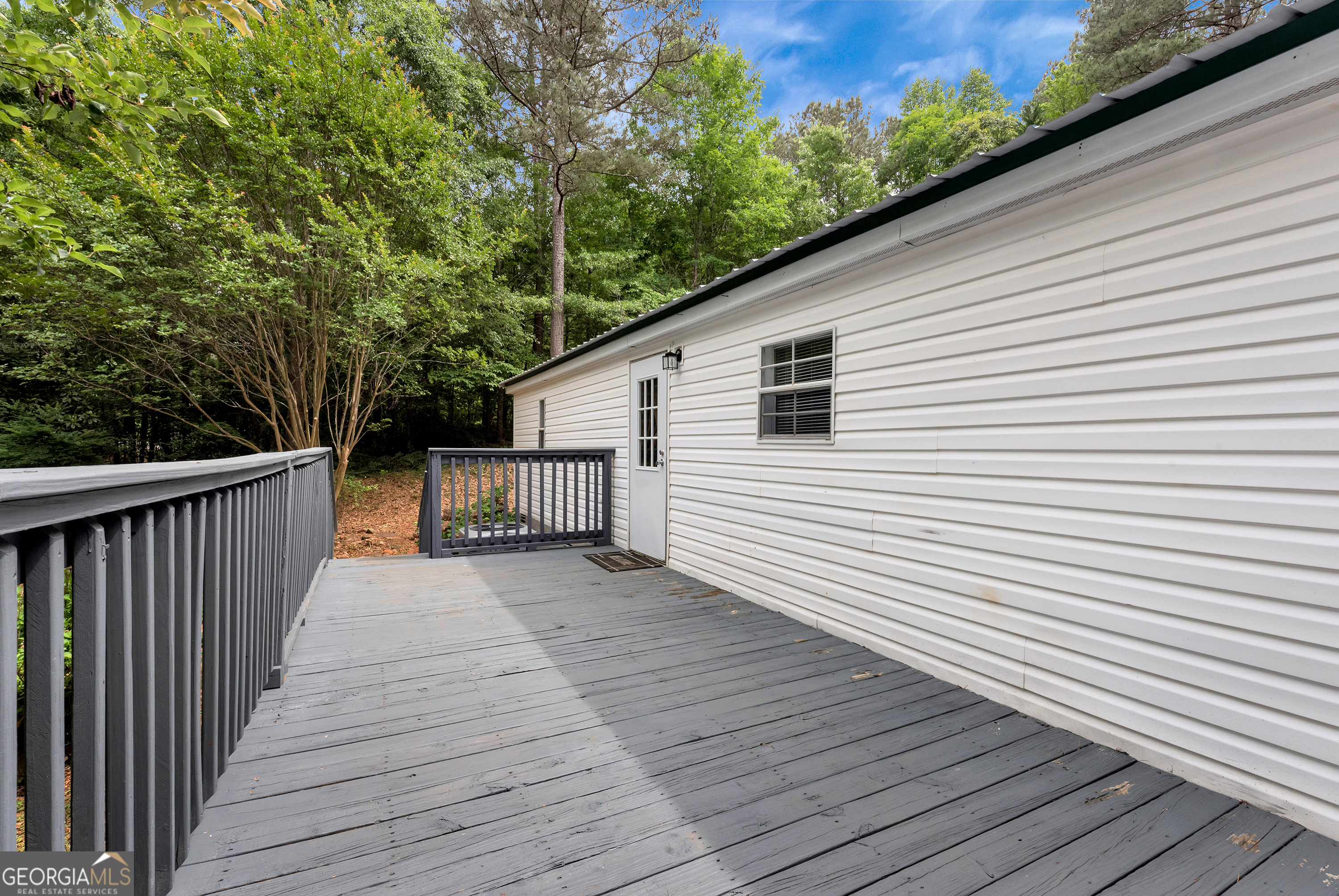 255 Double Branch Road Danielsville, GA 30633 - Photo 43 of 46 a view of a wooden deck