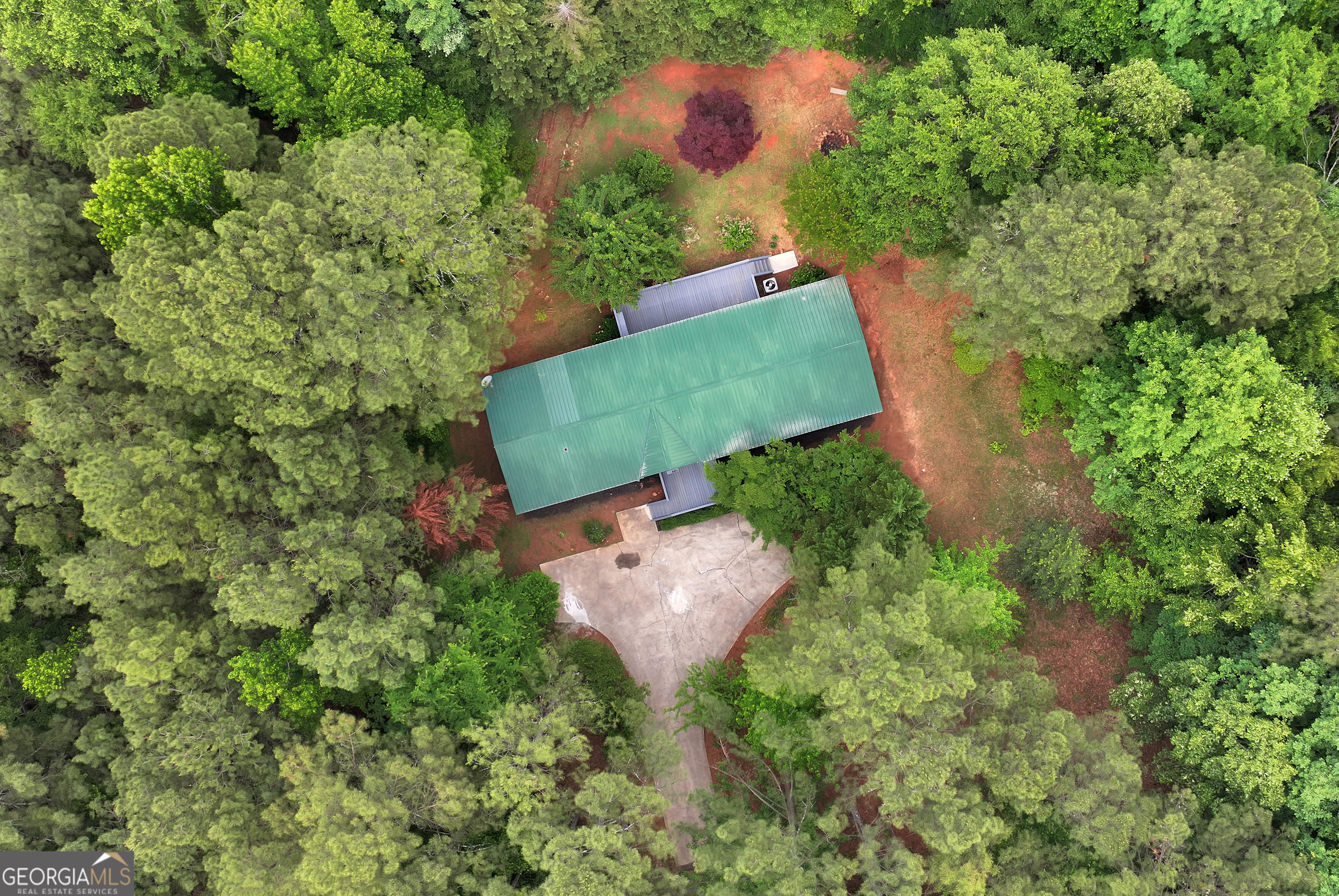 255 Double Branch Road Danielsville, GA 30633 - Photo 45 of 46 an aerial view of a house with a yard and lake view