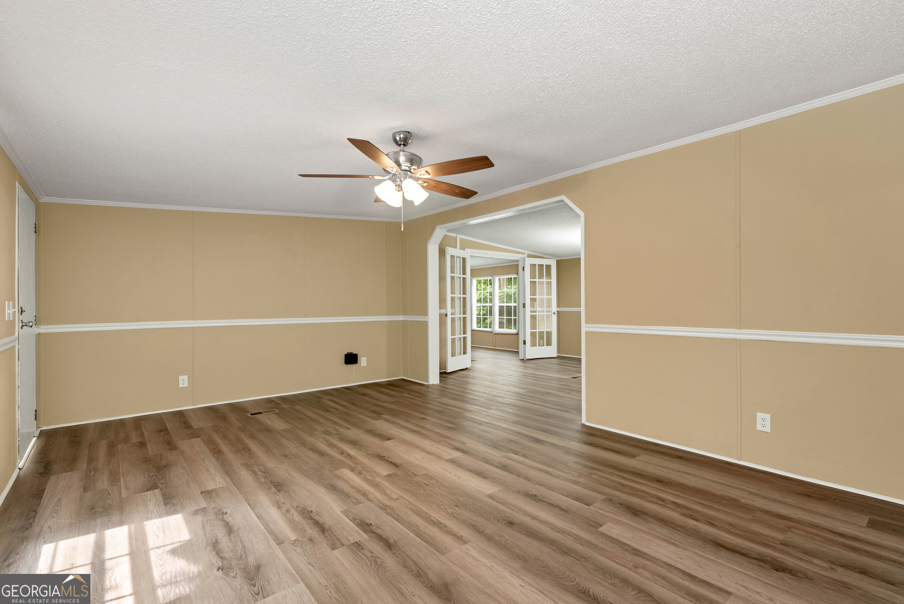 255 Double Branch Road Danielsville, GA 30633 - Photo 7 of 46 a view of a livingroom with wooden floor