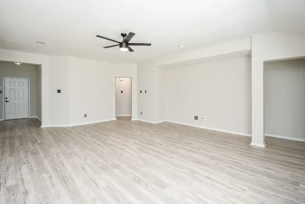 a kitchen with stainless steel appliances granite countertop a sink and cabinets